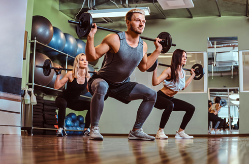 group doing exercise at gym