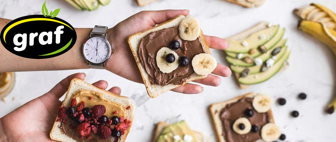 esh slice of tost bread with spreaded carob cream graf on the palm